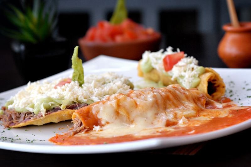 Chuys combination plate with taco enchilada and tamale